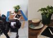 Kamera fotograferar ett kaffestilleben med växt och anteckningsbok