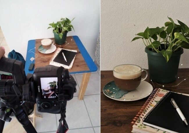 Kamera fotograferar ett kaffestilleben med växt och anteckningsbok